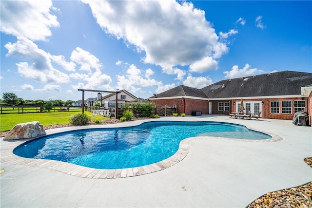 4518 Mars Hill Dr, Corpus Christi, TX 78413 - swimming pool with a fenced backyard and a patio
