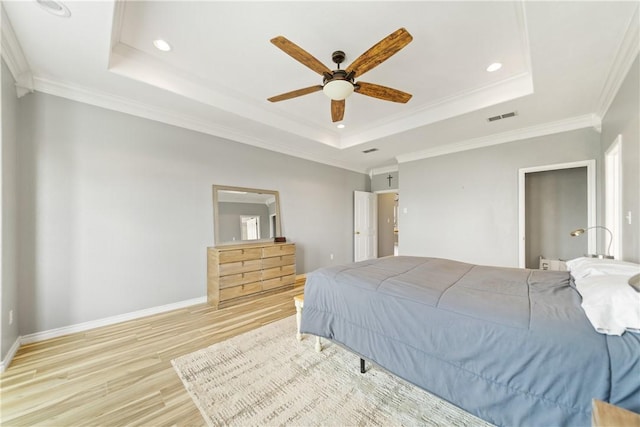 4518 Mars Hill Dr, Corpus Christi, TX 78413 - bedroom with a tray ceiling, wood finished floors, recessed lighting, crown molding, and ceiling fan