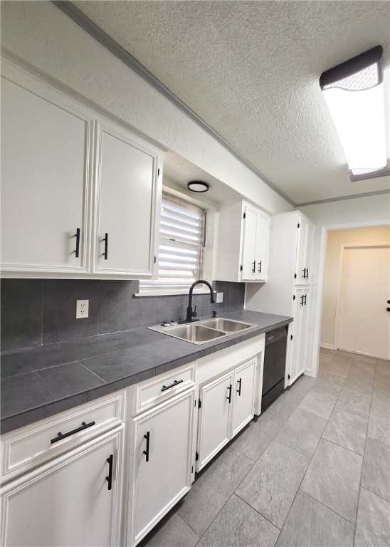 kitchen featuring sink, a textured ceiling, black dishwasher, and white cabinetry