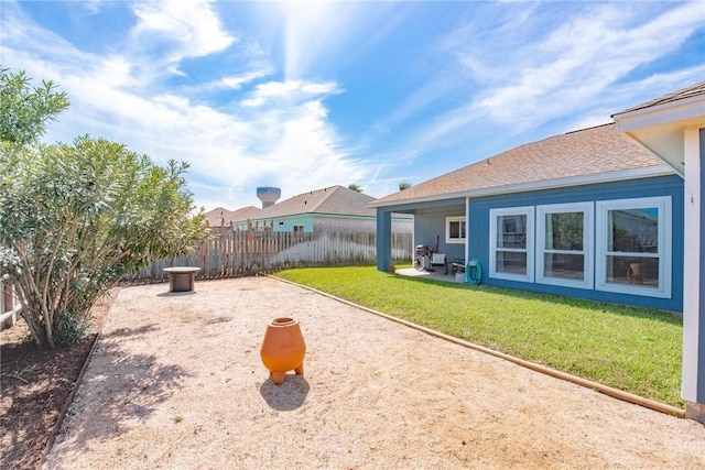 view of yard featuring a patio area and fence