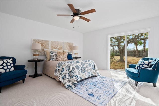 carpeted bedroom featuring access to outside and ceiling fan