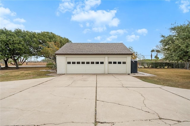 garage with a yard