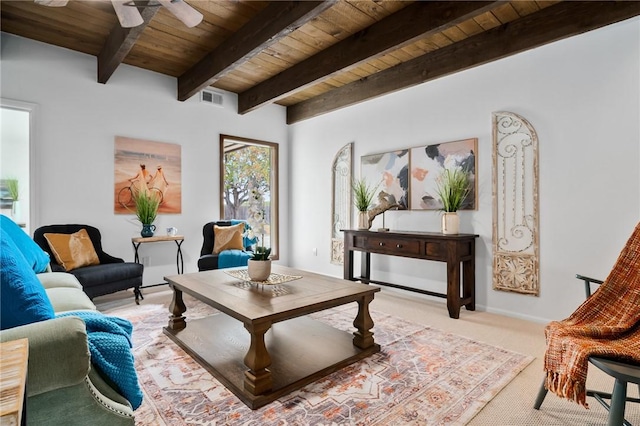 sitting room featuring beam ceiling, ceiling fan, light colored carpet, and wood ceiling