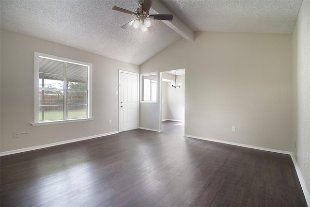 unfurnished room with ceiling fan with notable chandelier, lofted ceiling with beams, a textured ceiling, baseboards, and dark wood-style flooring