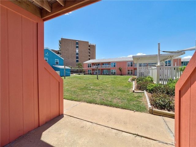 800 Beach Access Road 1a 509, Port Aransas, TX 78373 - view of grassy yard with a patio area