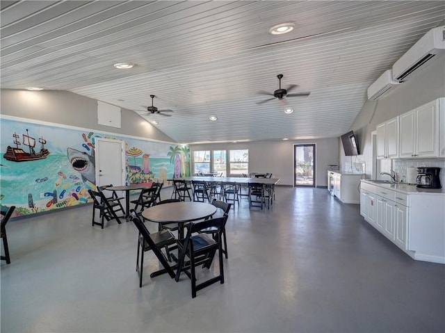 800 Beach Access Road 1a 509, Port Aransas, TX 78373 - dining room with lofted ceiling, concrete flooring, a ceiling fan, a wall mounted AC, and recessed lighting