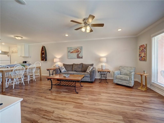 800 Beach Access Road 1a 509, Port Aransas, TX 78373 - living room featuring plenty of natural light, light wood finished floors, baseboards, ornamental molding, and recessed lighting