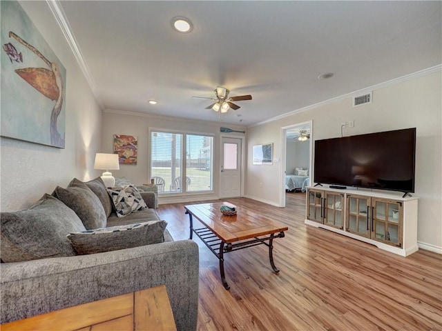 800 Beach Access Road 1a 509, Port Aransas, TX 78373 - living area featuring a ceiling fan, ornamental molding, baseboards, light wood-type flooring, and recessed lighting