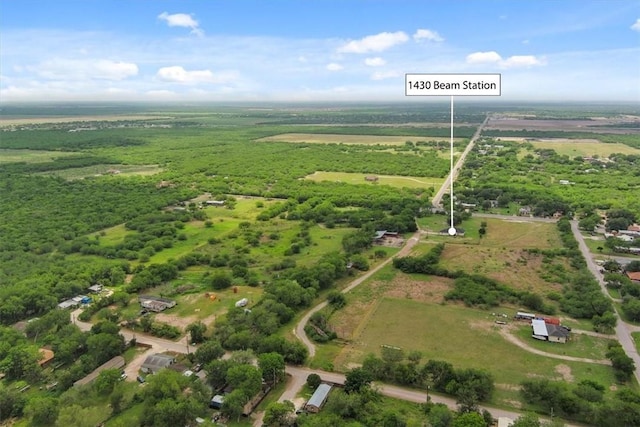 aerial view of property and surrounding area with rural landscape