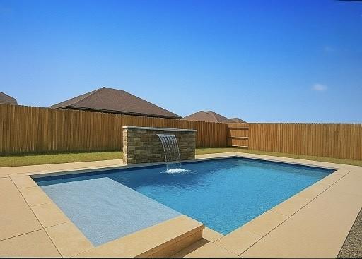 13817 Hawksnest Bay Dr, Corpus Christi, TX 78418 - view of pool with a fenced backyard