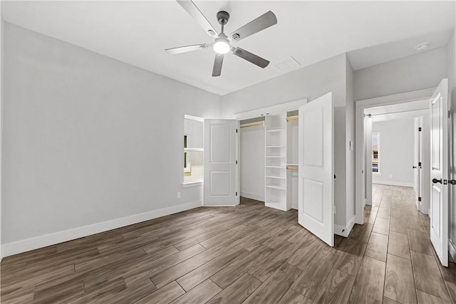 6218 Sadie St, Corpus Christi, TX 78415 - unfurnished bedroom with wood finished floors, a closet, and ceiling fan