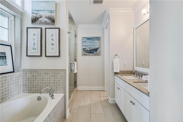 bathroom featuring vanity, crown molding, and plus walk in shower