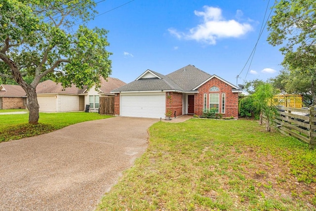 1201 Cline St, Corpus Christi, TX 78418 - view of front facade featuring brick siding, a garage, driveway, and roof with shingles