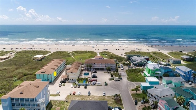 aerial view featuring a view of the beach and a water view