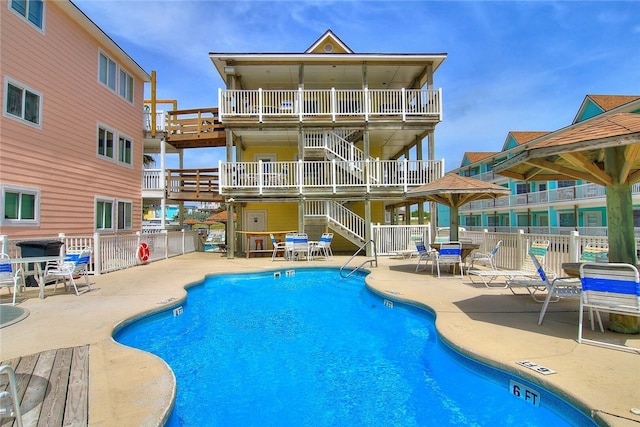 view of pool featuring a patio