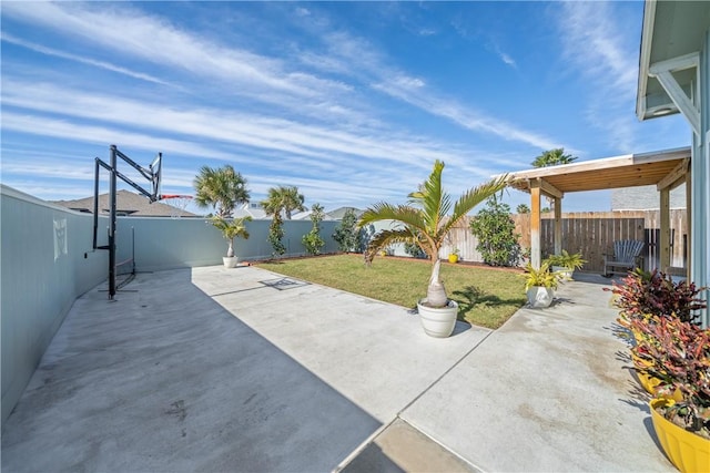 view of patio with a fenced backyard