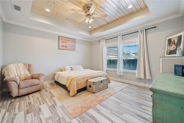 bedroom featuring wood ceiling, visible vents, a tray ceiling, and wood finished floors