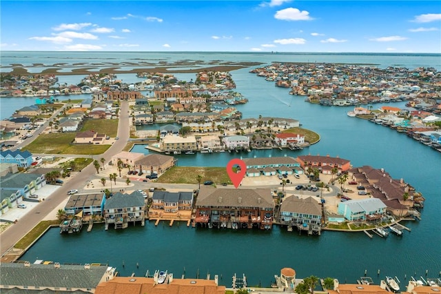 15414 Salt Cay Ct Unit 5E, Corpus Christi, TX 78418 - drone / aerial view featuring a water view and a residential view