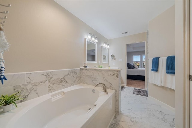 15414 Salt Cay Ct Unit 5E, Corpus Christi, TX 78418 - full bathroom featuring a garden tub, ensuite bathroom, marble finish floor, and visible vents