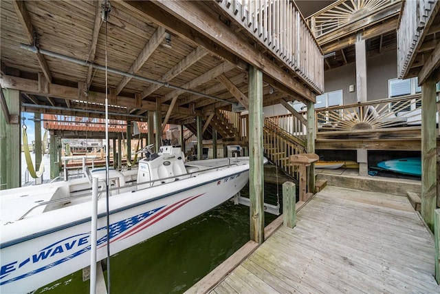 15414 Salt Cay Ct Unit 5E, Corpus Christi, TX 78418 - view of dock featuring boat lift