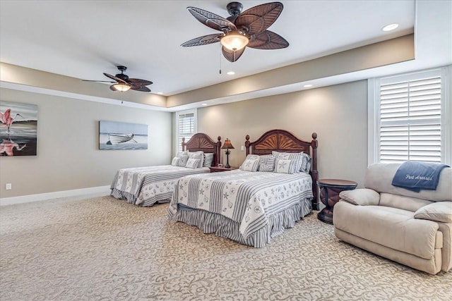 bedroom featuring light carpet and ceiling fan