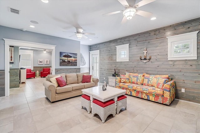 living room featuring wooden walls