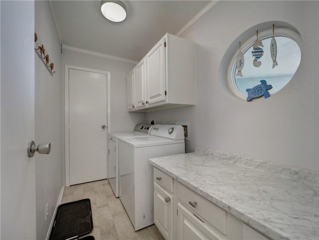 5973 State Highway 361 Unit 218, Port Aransas, TX 78373 - laundry room with cabinet space, washer and clothes dryer, and ornamental molding