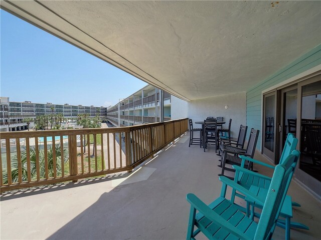 view of patio / terrace with a balcony