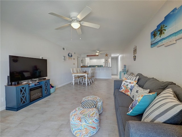 living room featuring ceiling fan