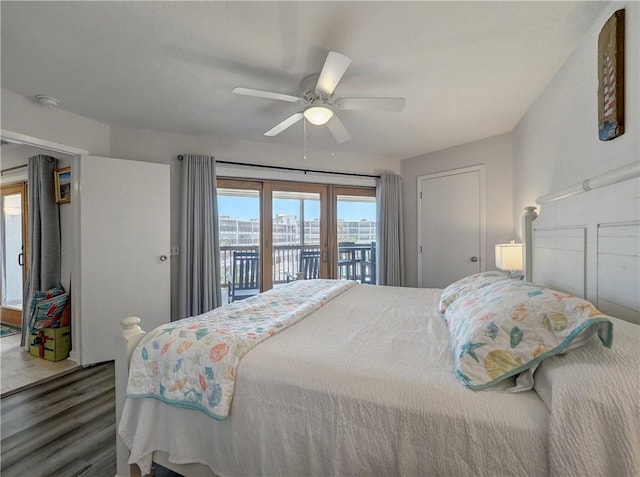 5973 State Highway 361 Unit 218, Port Aransas, TX 78373 - bedroom with access to outside, wood finished floors, and ceiling fan