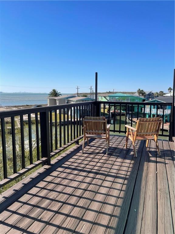 deck featuring a water view