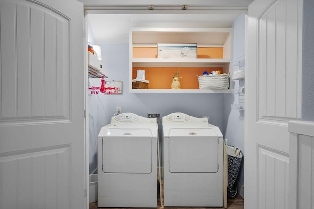 clothes washing area featuring laundry area and independent washer and dryer