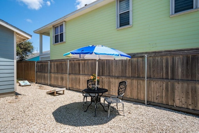 view of patio / terrace with fence