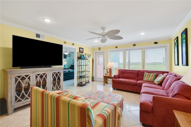 living area featuring ornamental molding, a ceiling fan, recessed lighting, and light tile patterned floors