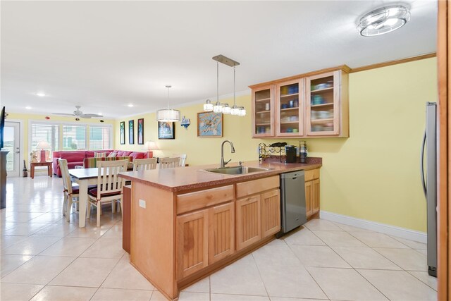 kitchen featuring decorative light fixtures, stainless steel appliances, glass insert cabinets, ornamental molding, and open floor plan