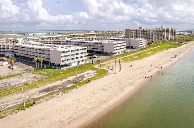 drone / aerial view with a view of the beach and a water view