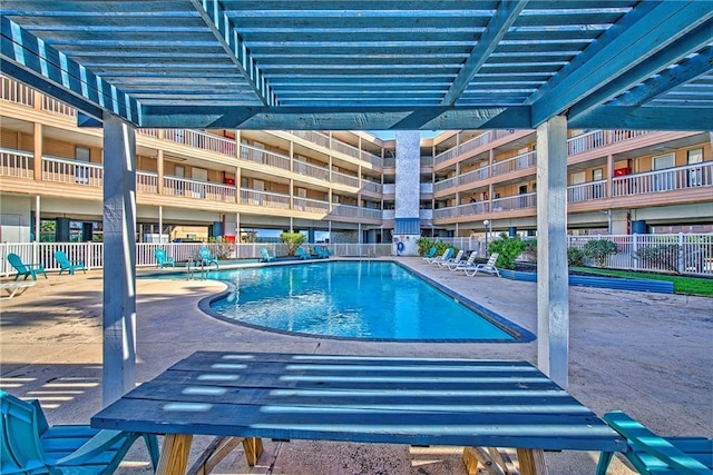 view of swimming pool featuring a patio