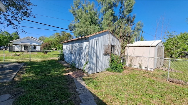 view of shed with fence