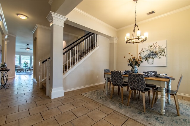 tiled dining space featuring ornate columns, ornamental molding, and ceiling fan with notable chandelier