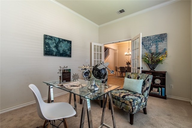 dining space with a chandelier, ornamental molding, and carpet