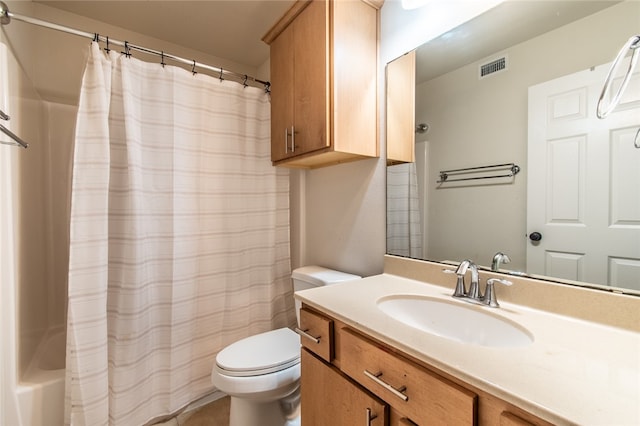 full bathroom with shower / bath combo, vanity, and toilet