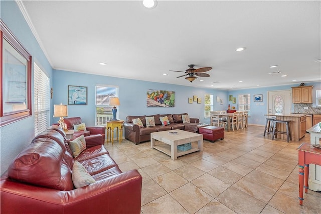 616 Sandcastle Dr, Port Aransas, TX 78373 - living room with recessed lighting, a ceiling fan, ornamental molding, and light tile patterned flooring