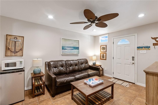 616 Sandcastle Dr, Port Aransas, TX 78373 - living room featuring a ceiling fan, baseboards, and recessed lighting