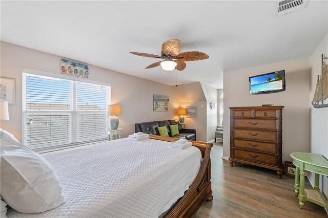 616 Sandcastle Dr, Port Aransas, TX 78373 - bedroom with wood finished floors and ceiling fan