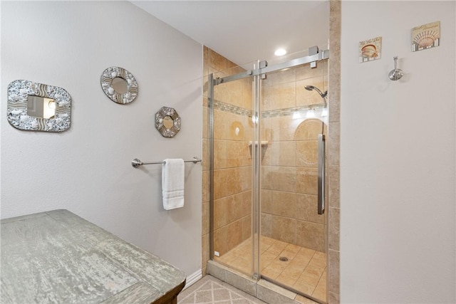 616 Sandcastle Dr, Port Aransas, TX 78373 - bathroom featuring a stall shower, baseboards, and recessed lighting