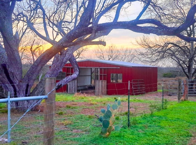 112 Fm 1042, Three Rivers, TX 78071 - outdoor structure at dusk with an outbuilding