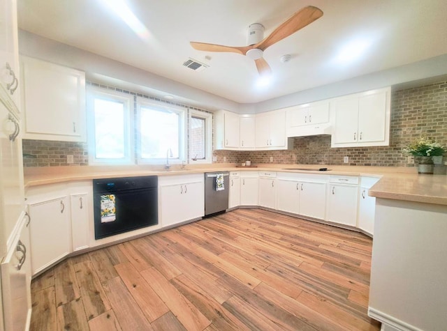 112 Fm 1042, Three Rivers, TX 78071 - kitchen featuring black appliances, light wood finished floors, tasteful backsplash, ceiling fan, and white cabinetry