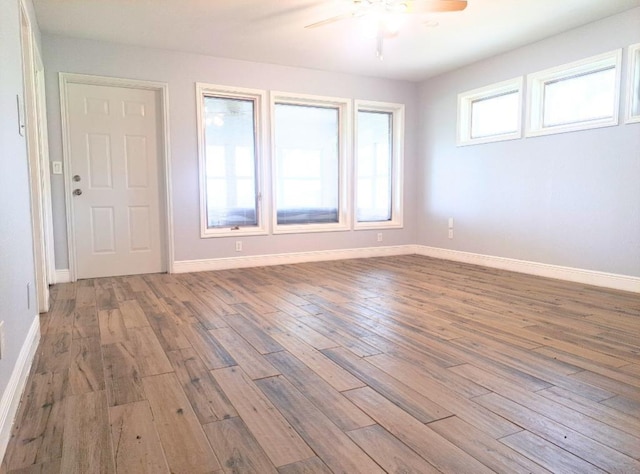 112 Fm 1042, Three Rivers, TX 78071 - spare room featuring a ceiling fan, healthy amount of natural light, and wood finished floors