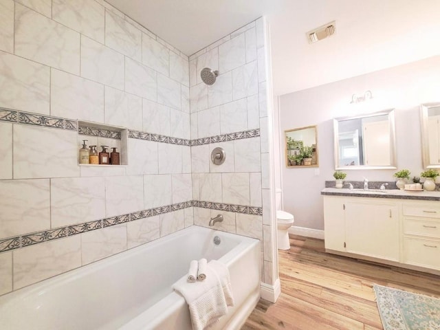 112 Fm 1042, Three Rivers, TX 78071 - full bathroom featuring vanity, wood finished floors, and  shower combination