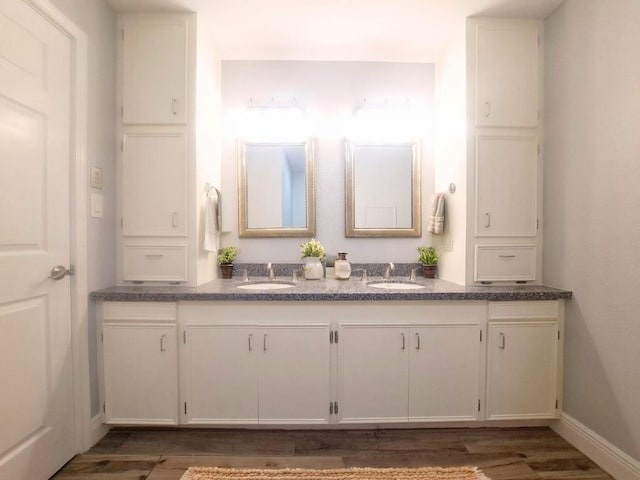 112 Fm 1042, Three Rivers, TX 78071 - full bath with double vanity and wood finished floors